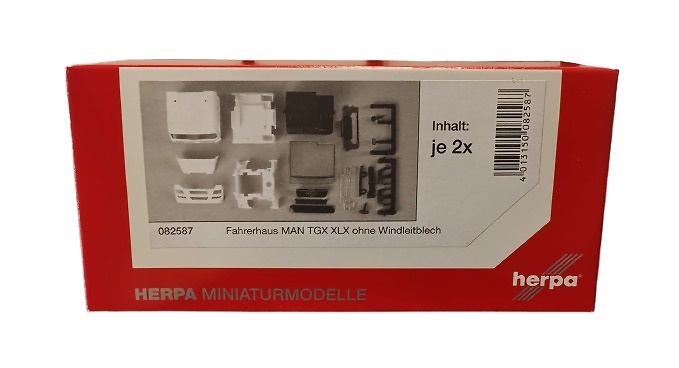 MAN TGX XLX driver's cabin without side skirting, with roof spoiler (incl. rear-view mirror)Content: 2 pcs. Herpa scale 1/87 